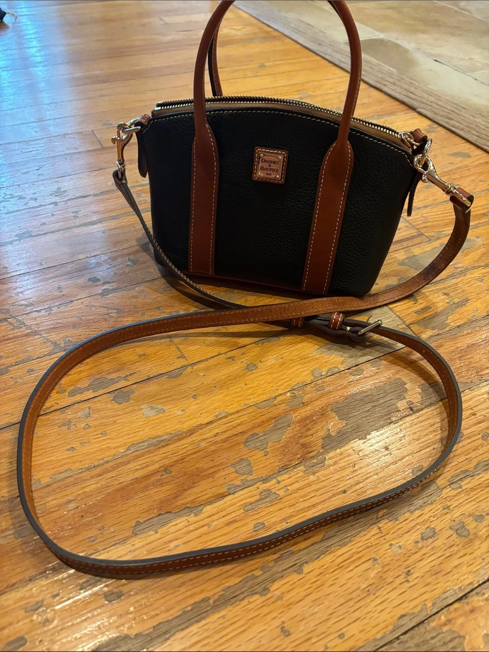 Dooney & Bourke Black Pebbled Leather Crossbody with Brown Trim